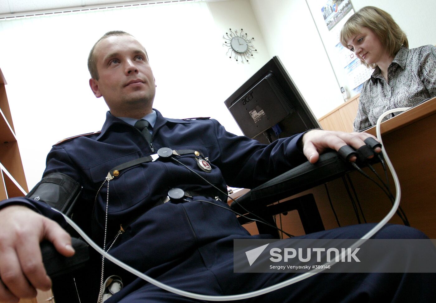 Police officers undergoing lie-detector test