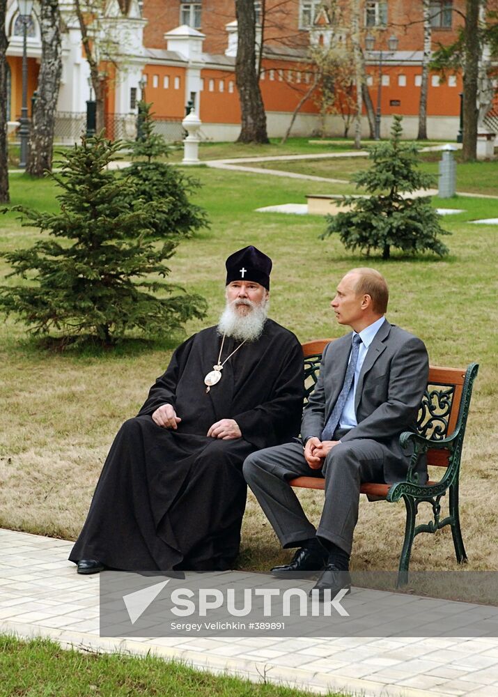 Vladimir Putin and Alexy II