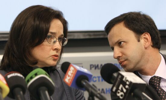 Elvira Nabiullina and Arkady Dvorkovich at RIA Novosti agency