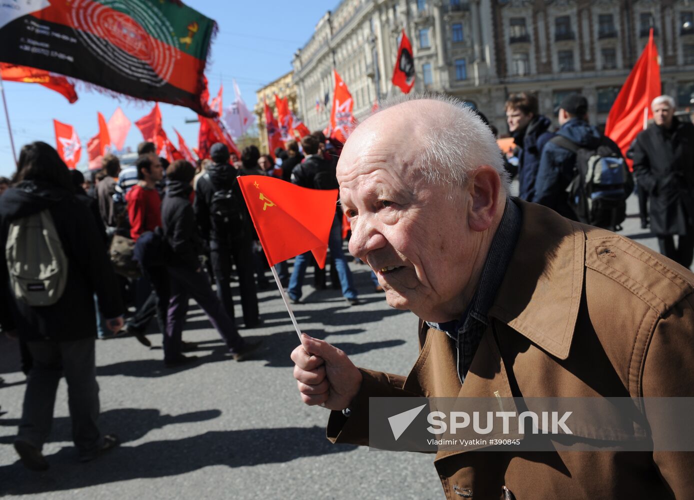 Communist Party supporters hold Labor Day march