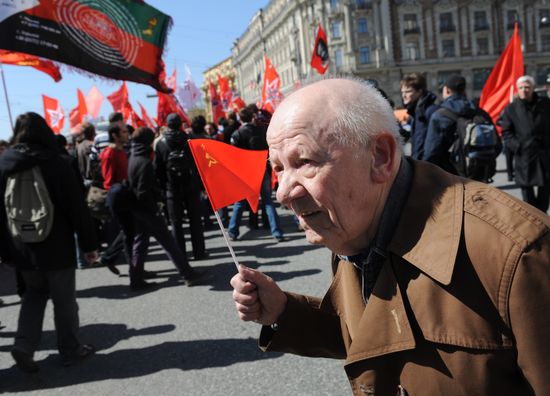 Communist Party supporters hold Labor Day march
