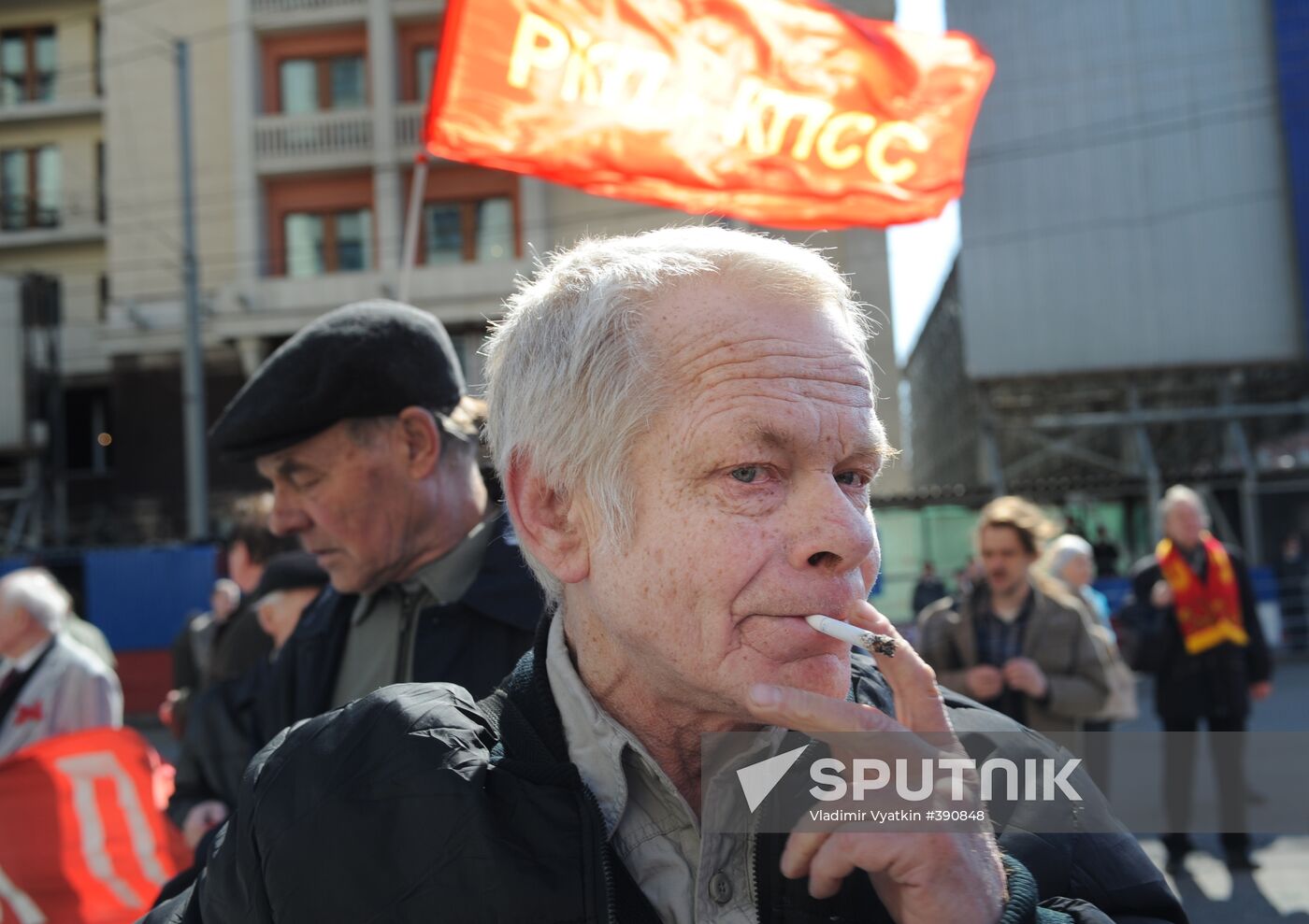 Communist Party supporters hold Labor Day march