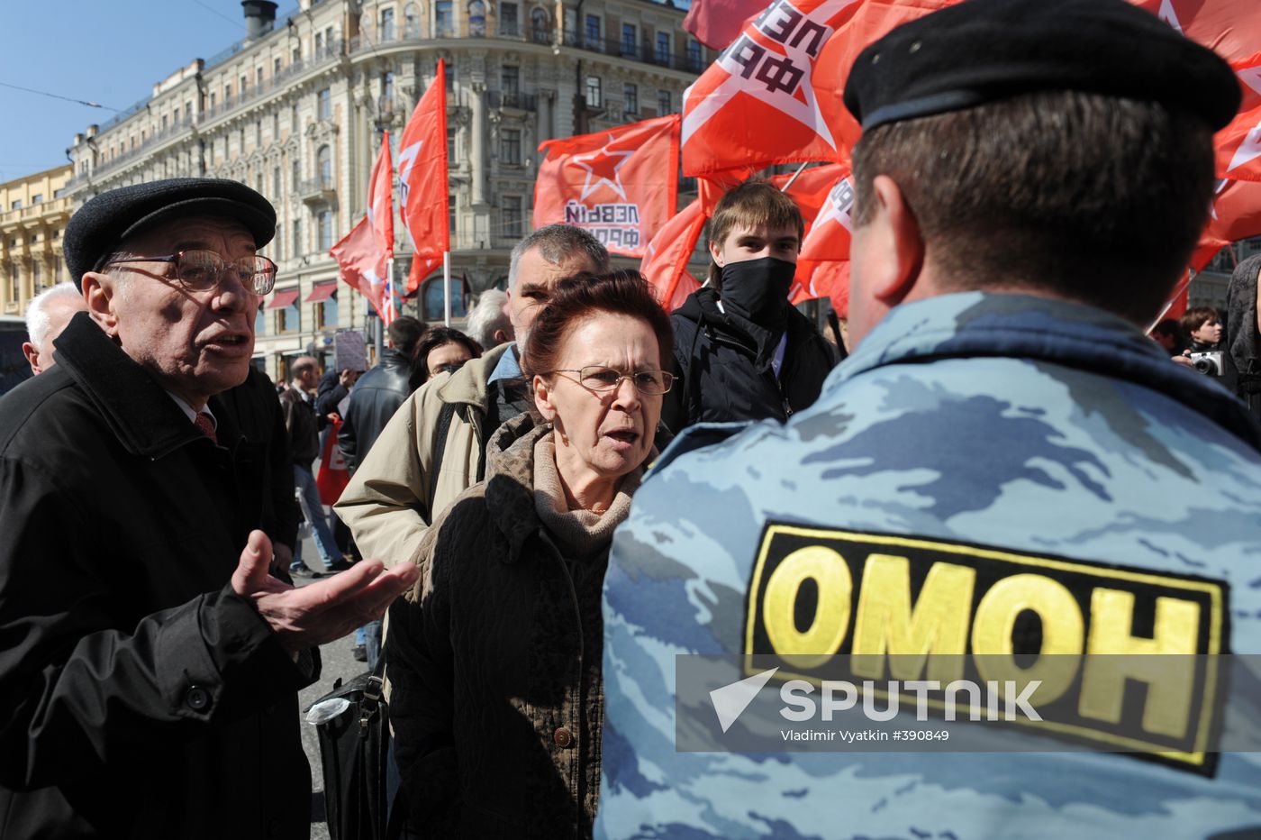 Communist Party supporters hold Labor Day march