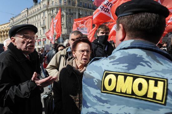Communist Party supporters hold Labor Day march