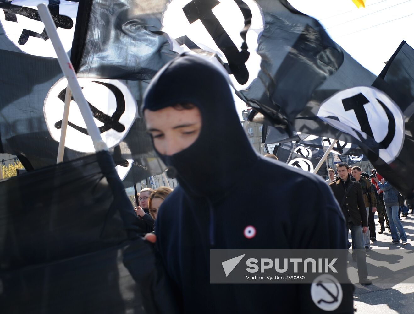 Communist Party supporters hold Labor Day march