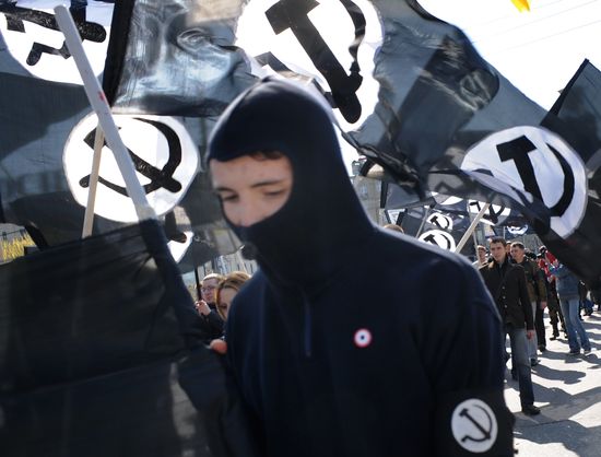 Communist Party supporters hold Labor Day march