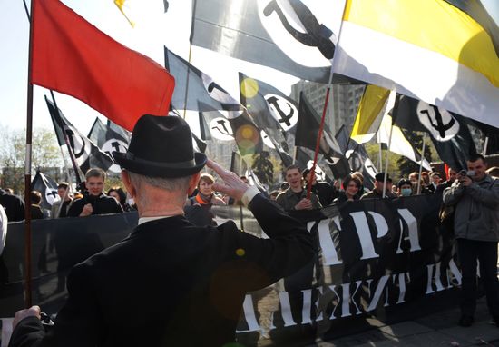 Communist Party supporters hold Spring and Labor Day march