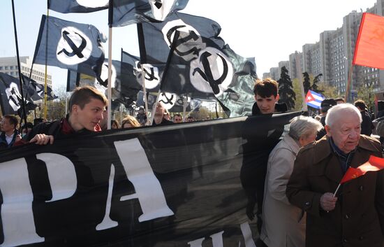 Communist Party supporters hold Labor Day march