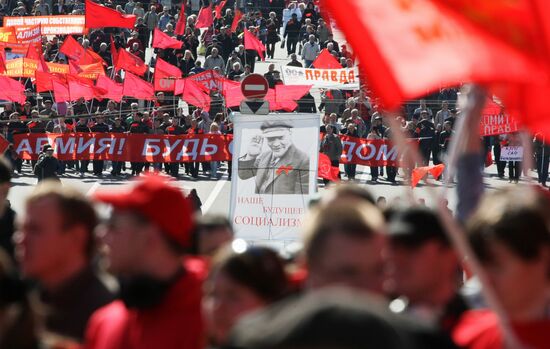 Communist Party supporters hold Labor Day march