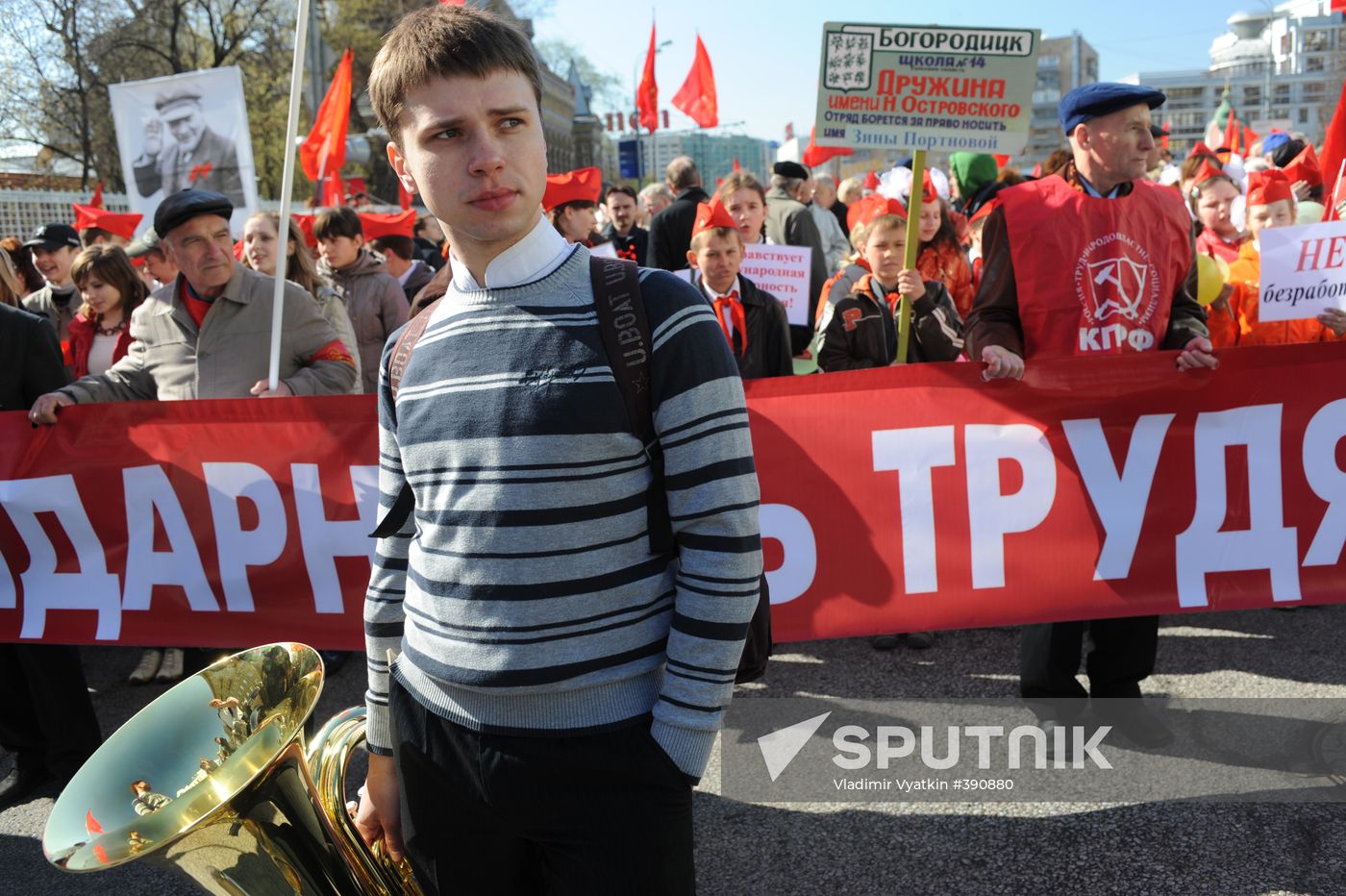 Communist Party supporters hold Labor Day march