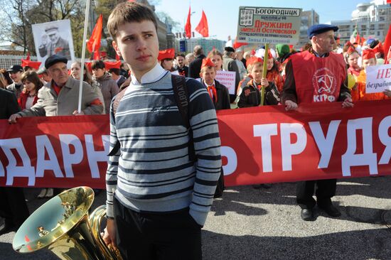Communist Party supporters hold Labor Day march