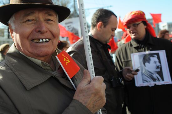 Communist Party supporters hold Labor Day march