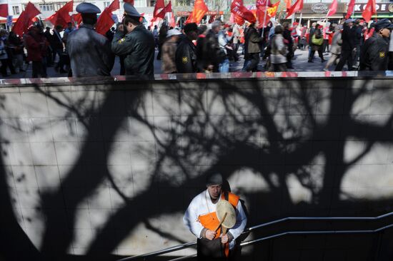 Communist Party supporters hold Labor Day march