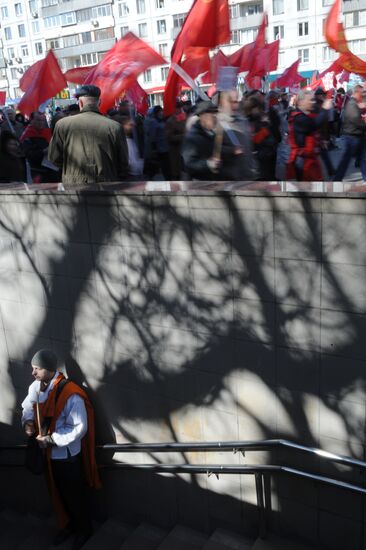 Communist Party supporters hold Labor Day march
