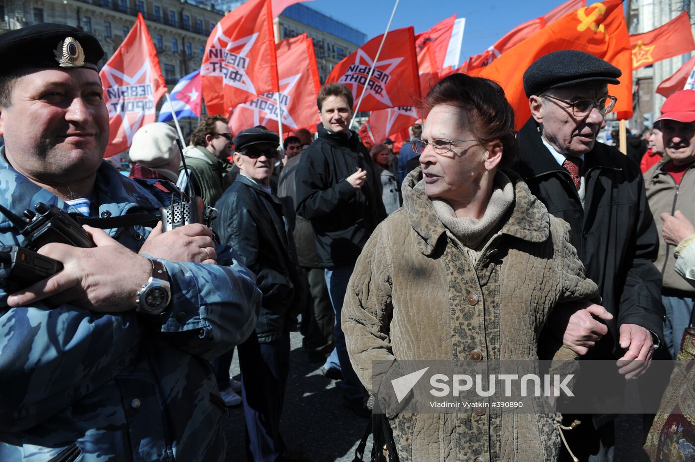Communist Party supporters hold Spring and Labor Day march