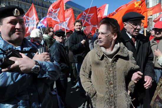 Communist Party supporters hold Spring and Labor Day march