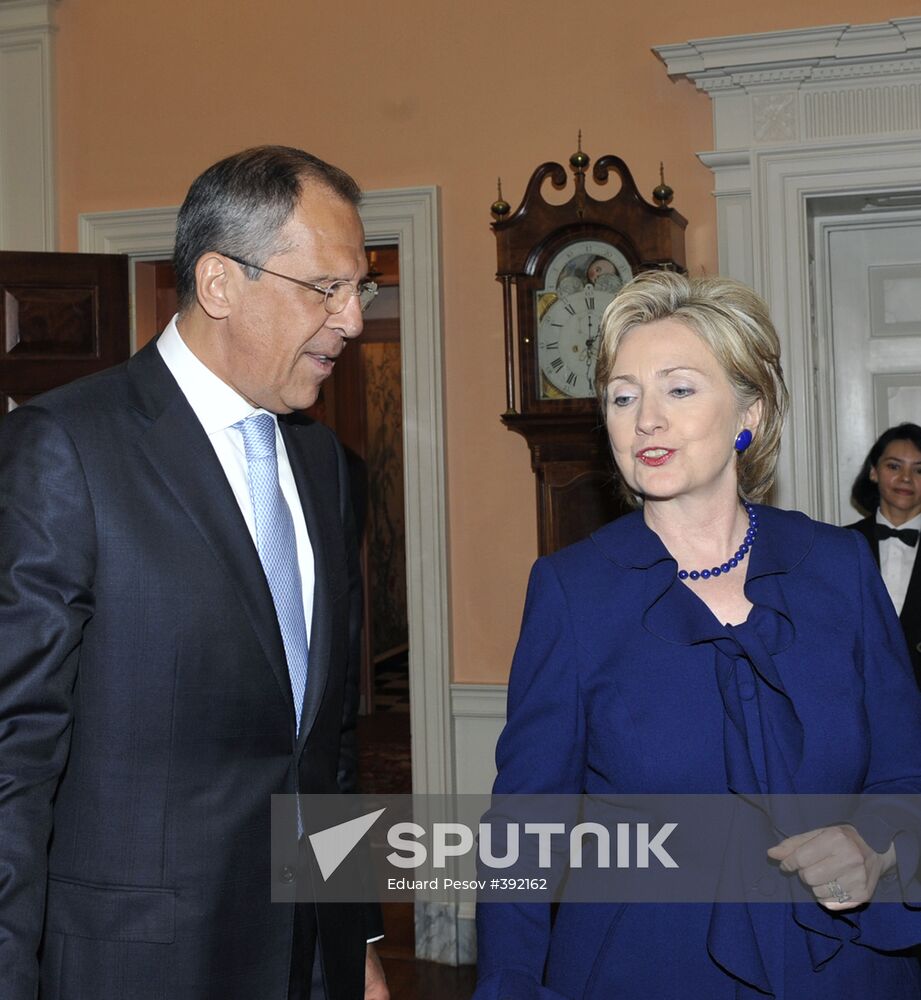 Sergei Lavrov and Hillary Clinton