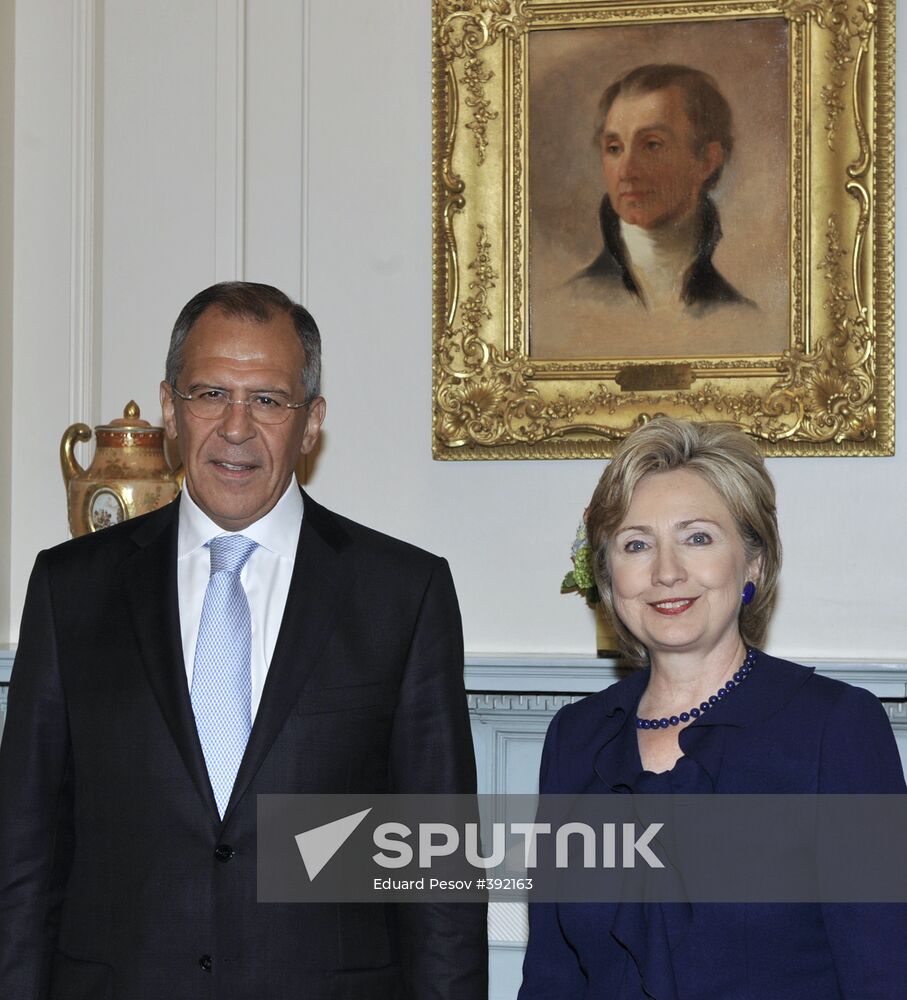 Sergei Lavrov and Hillary Clinton