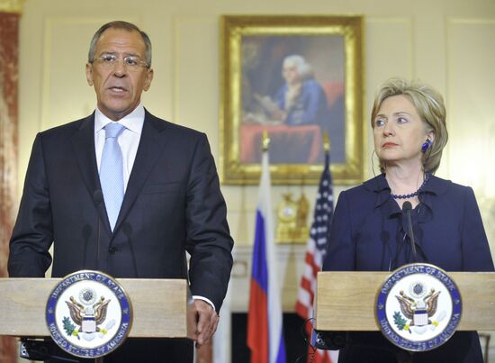 Sergei Lavrov and Hillary Clinton