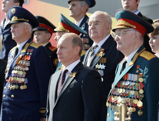 Russian PM Vladimir Putin attends Victory Day parade