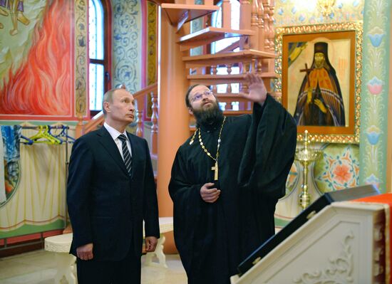 Vladimir Putin visits Holy Trinity Cathedral in Ulan Bator