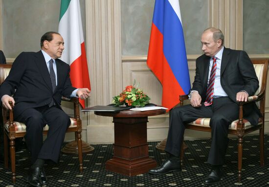 Vladimir Putin meets with Silvio Berlusconi in Sochi