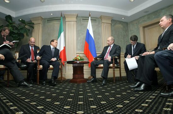 Vladimir Putin meets with Silvio Berlusconi in Sochi