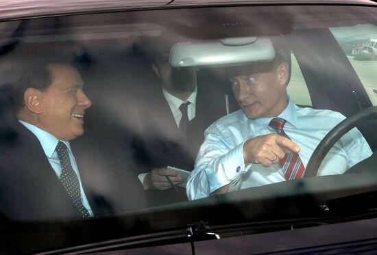 Vladimir Putin meets with Silvio Berlusconi in Sochi