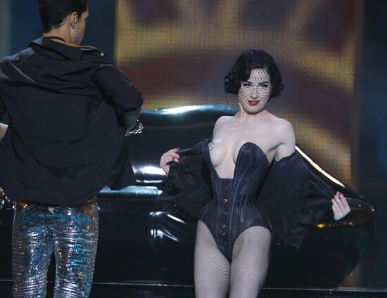 Germany's Oscar Loya, Dita von Teese