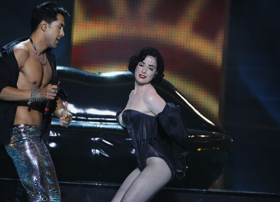 Germany's Oscar Loya, Dita von Teese