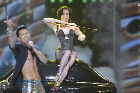 Germany's Oscar Loya, Dita von Teese