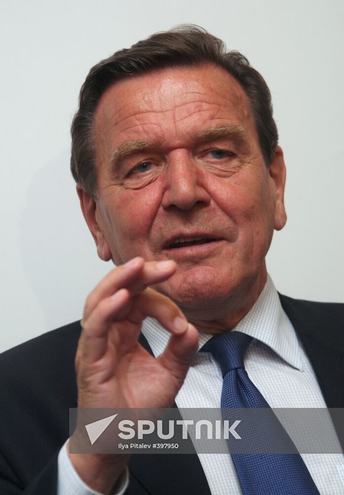 Gerhard Schröder at a news conference in Moscow
