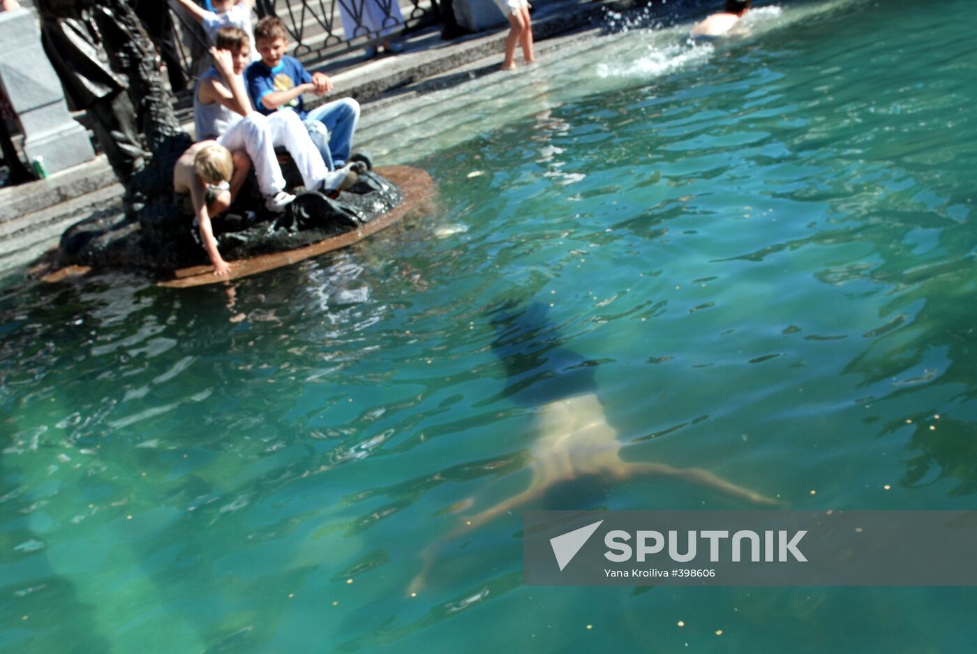 Young people swimming in downtown Moscow
