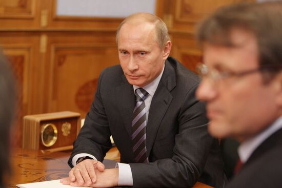 Vladimir Putin and German Gref