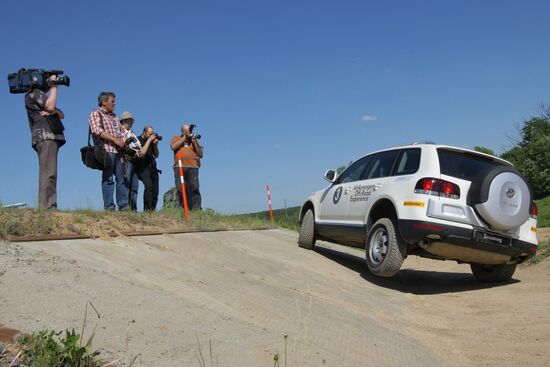 Participants test-drive Volkswagen SUVs outside Moscow