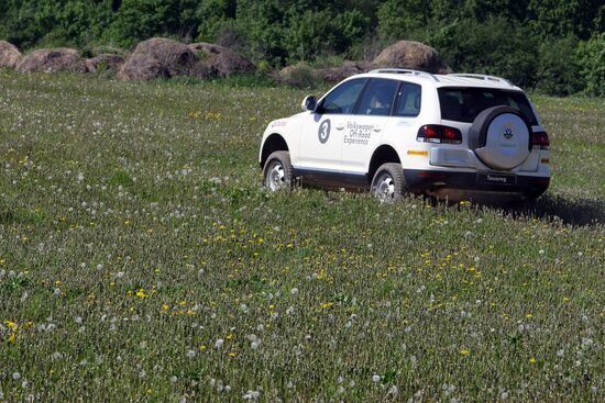 Participants test-drive Volkswagen SUVs outside Moscow