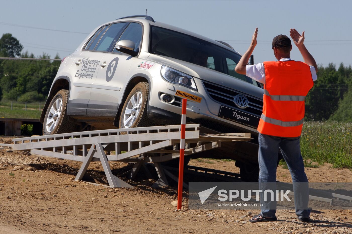 Participants test-drive Volkswagen SUVs outside Moscow