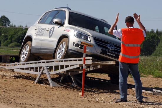 Participants test-drive Volkswagen SUVs outside Moscow