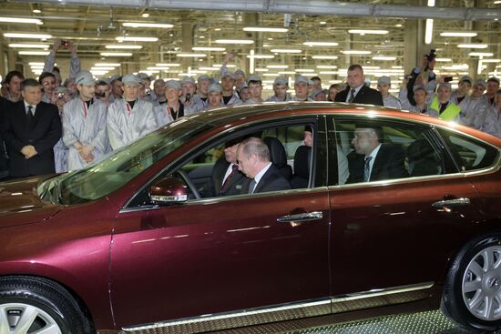 Vladimir Putin attends opening ceremony of Nissan plant