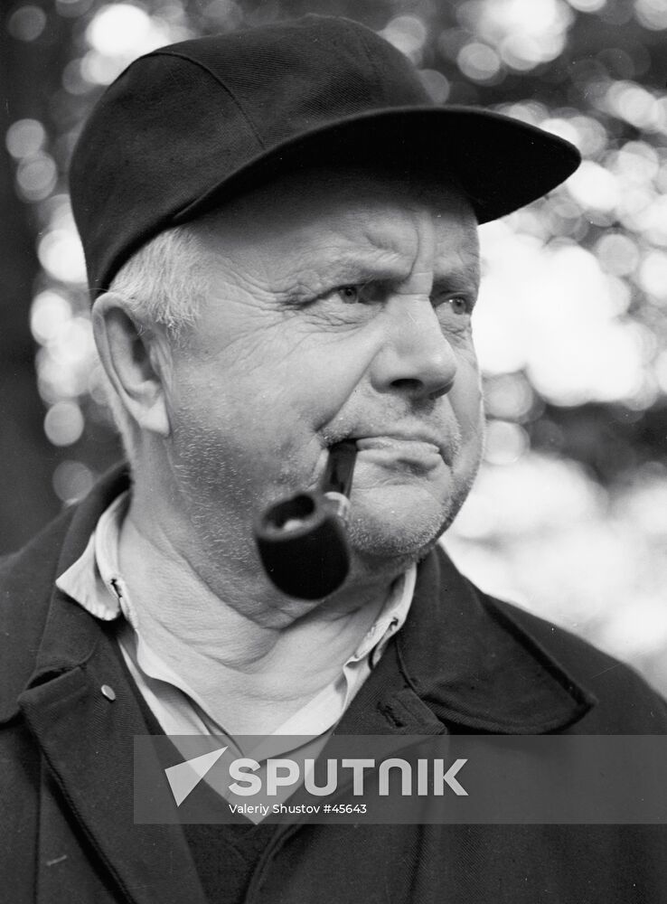 RETIRED MAN PIPE SMOKING