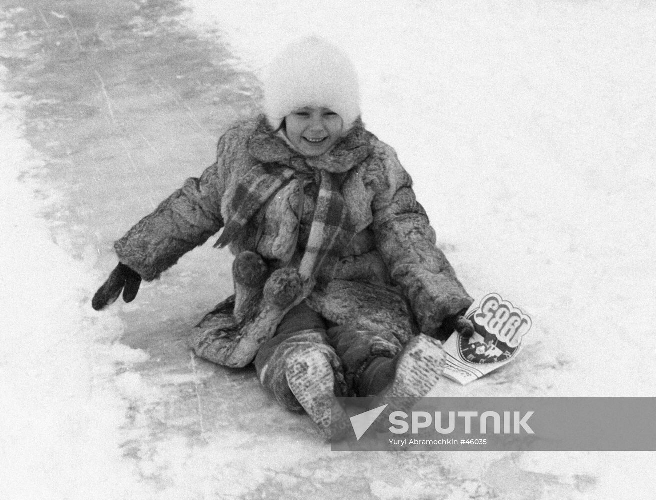 SMALL GIRL ICE SLIDE