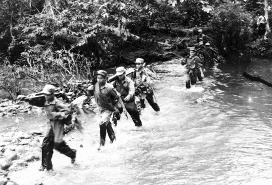 LAOS SOLDIERS RIVER AMERICAN INVASION