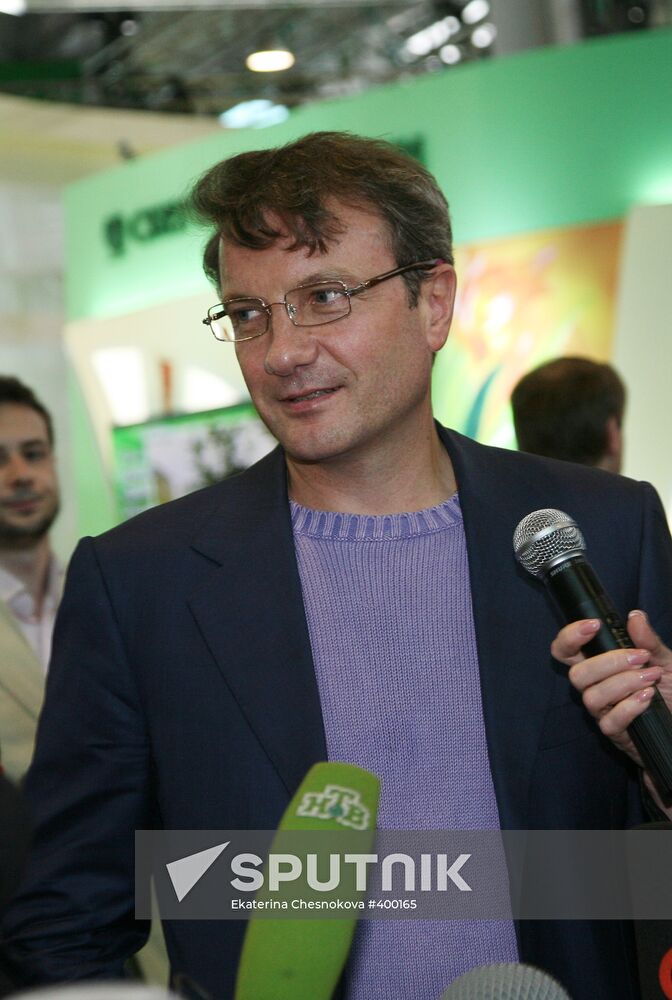German Gref at Sberbank exhibit during PIEF.