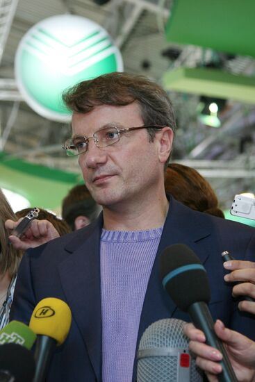 German Gref at Sberbank exhibit during PIEF.