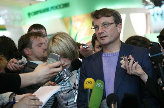 German Gref at Sberbank exhibit during PIEF.