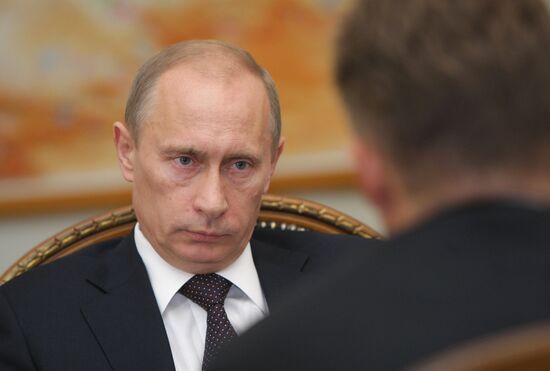 Vladimir Putin and Alexey Miller in Novo-Ogaryovo
