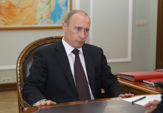Vladimir Putin and Alexey Miller in Novo-Ogaryovo