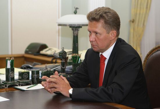 Vladimir Putin and Alexey Miller in Novo-Ogaryovo