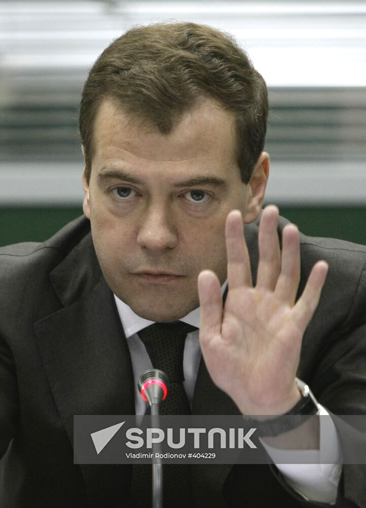 Dmitry Medvedev chairing commission meeting