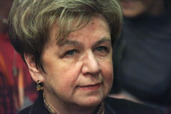 Olga Larionova attends press conference